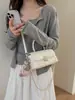Bolso de hombro cruzado para mujer con cadena de rombos transfronteriza, diseño de nicho nuevo para el verano de 2026, bolso de mano pequeño cuadrado con sensación de alta gama
