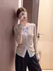 Suéter de punto de manga larga con bloques de color de alta gama para mujer, nuevo estilo otoño/invierno, bellamente único, adelgazante y versátil capa base