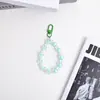 Nuevo llavero de cadena de cuentas de flor pequeña de acrílico de colores para coche, accesorio de flor de cinco pétalos chapado, decoración para funda de auriculares