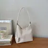Bolsa de Hombro/Axila Versátil de Moda Exquisita de Diseño de Nicho de Gama Alta para Viajes de Negocios de Verano 2026
