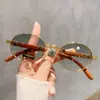 Gafas de sol Retro Europeas y Americanas Nuevas con Imitación de Grano de Madera para Hombres, Gafas de Sol Ovaladas para Mujeres, Gafas de Sol Modernas y a la Moda con Protección UV