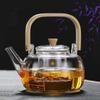 Tetera de vidrio para hervir, para uso doméstico, calentable, resistente al calor, para hervir agua, separar sopa, transparente, con forma de flor.