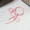 Colgante de Cinta de Lazo Hueco de Aleación de Zinc Pintado en Spray Dulce de Colores Adorno Colgante DIY Accesorio para Cadena de Teléfono Moderno