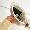 Nova porta-moedas de veludo cotelê com bolinhas, uma bolsa portátil para batom e maquiagem para mulheres, apresentando um design fofo e grande capacidade de armazenamento.