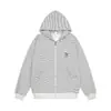 Sudadera con capucha a rayas estilo coreano con bordado de durazno, disponible para hombres y mujeres, nueva colección otoño 2026, estilo holgado y casual