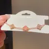 Pulseira Flor Trevo da Sorte em Resina com Zircônia Estilo Levemente Luxuoso Retrô Europeu e Americano Nicho de Alta Qualidade Exquisita Personalizada Joia de Mão para Mulheres