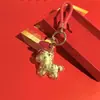 Concha de Agua Mismo Estilo Serie de la Fortuna Bolsa de Riqueza Instantánea Colgante de Llavero Dorado para Teléfono Regalo Práctico para Clientes