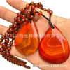 Pulsera Roja del Período de los Reinos Combatientes con Ágata Envuelto en Seda y Colgante de Jade en Forma de Lágrima