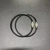 Em estoque Chaveiro de anel de cabo de aço Anel de aço inoxidável com revestimento de borracha colorida Fivela de trava de cabo de aço com revestimento de plástico Grande quantidade negociável E18