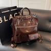 Diseño de nicho estilo extranjero bolso de mujer 2025 nuevo bolso de hombro de gran capacidad moda retro personalidad tendencia bolso para ir al trabajo