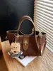 Bolso de Mujer Estilo de Alta Gama Yuezi 2026 Nuevo Bolso de Mano de Moda para Viajes Diarios Bolso Cruzado Elegante Versátil Bolso de Hombro Tipo Cubo