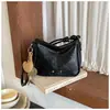 Bolso versátil para el día a día de moda transfronteriza para mujer, bolso de hombro cruzado de moda con textura de cuero encerado, bolso de axila de alta apariencia