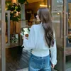 Toma real: Camisa sofisticada de manga larga estilo francés con diseño de cinta, camisa blanca corta versátil para mujer con tapeta lateral 19581