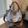 Bolsa Satchel Retrô de Grande Capacidade para Mulheres 2025 Nova Tendência Design de Nicho Bolsa Tote Simples de Alta Qualidade Bolsa Transversal