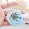 Máquina electrónica de mascotas mini de mano más vendida, máquina de juego de mascotas virtuales, llavero, colgante de regalo pequeño creativo