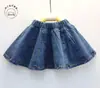Saia Curta para Meninas 2018 Roupas Infantis para Meninas Saia Jeans Lavada Mais Fácil de Combinar Saia Jeans Curta com Rebites Substituta de Peça Única