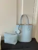 Bolso de mano minimalista de moda transfronterizo para mujer, nuevo bolso cubo de hombro elegante y moderno, bolso cruzado versátil