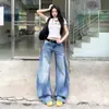 Jeans retro americanos de pierna ancha y corte curvo para mujer, talla 26, diseño de verano, lavados, holgados, pantalones banana caídos, disponibles para venta al por mayor
