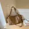 Nova Bolsa de Lona Outono 2026 Estilo Coreano Retrô Cor Sólida Grande Capacidade Bolsa Tote para Trabalho Deslocamento Bolsa de Ombro Casual