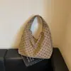 Bolso de mano minimalista de lunares transfronterizo, nuevo bolso de pana versátil de moda 2026, bolso de hombro elegante y moderno