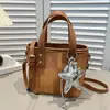Bolsa Estilo Luxo Leve para Mulheres 2026 Verão Nova Vintage Cor Sólida Bolsa de Mão Versátil Bolsa Saco Casual