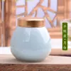 Tarro Mini Celadón Tapa Metálica Sellado Tarro para Té Tarro Sellado a Prueba de Humedad Botella para Polvos Aromáticos Tarro de Almacenamiento de Alimentos Modelo Portátil para Viaje