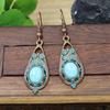 Pendientes de borlas bohemios vintage transfronterizos nuevos, pendientes redondos de metal desgastado, pendientes de estilo étnico al por mayor