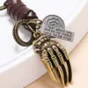 Joyas de Moda Transfronterizas de Alta Venta Colgante Creativo de Aleación Hueso de Mano Llavero Decorativo Accesorio Trenzado de Cuero Estilo Retro