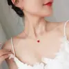 Collar de amor sencillo de estilo japonés y coreano, cadena de clavícula con astas cruzadas, flor, perla y colgante de latido de corazón de celebridad cibernética.