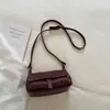 Bolsos populares para mujer de este año 2026 nuevo de moda versión coreana versátil tejido bandolera para axila bolso de mano de alta gama