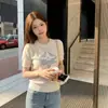 Zhong Feifei Primavera 2026 Nuevo Suéter para Mujer Chic Elegante Top de Manga Corta de Gama Alta Único y Hermoso