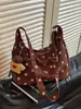 Bolso de lunares para mujer, nueva colección de otoño 2026, estilo de alta gama, bolso de hombro de gamuza con efecto Maillard, bolso tipo dumpling de gran capacidad