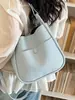 Bolso cruzado casual de diseño de nicho de moda transfronterizo, patrón simple de lichi, bolso de alta gama para madre e hija para ir al trabajo, bolso cruzado versátil