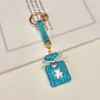 Colgante de llavero de oso con botella de perfume incrustada de diamantes de arcilla, decoración creativa linda de bolsa de fragancia pequeña con diamantes brillantes, llavero de coche