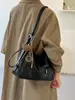 Dropshipping disponível: Nova bolsa de ombro feminina 2026, moderna e simples, versátil para o trabalho, com um toque de luxo