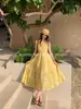 Xiu Xixi 2026 Primavera/Verão Novo Vestido Francês Elegante de Tencel e Linho com Amarração no Pescoço Estilo Férias Longo 88536