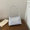 Bolso de hombro elegante y versátil de estilo coreano, con textura, lunares de nicho, nuevo de moda 2026, de alta apariencia, simple