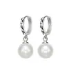 Aretes florales de perlas de nuevo estilo para mujer, lujo ligero, modernos, versátiles, de nicho, aretes de alta gama, venta al por mayor desde el fabricante