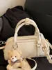 2026 Nuevo Modelo Bolso de Hombro Texturizado de Color Sólido de Moda Elegante para Mujer Bolso Boston de Moda Bolso Cruzado de Moda
