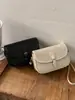 Bolsos de diseñador de nicho para mujer 2026 nuevos bolsos de hombro y cruzados de moda de alta gama de otoño e invierno bolsos cuadrados pequeños retro