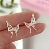 Pendientes de mariposa con forma de corazón de diamante rosa para mujer, ligeros, lujosos, de alta gama, con un estilo dulce y moderno.