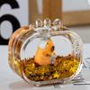 Red de internet aceite de capibara adornos de escritorio pequeños regalos mayoreo botella de arena movediza acrílica llavero colgante para bolsa