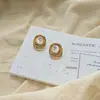 Pendientes Redondos Dorados Estilo Europeo con Zirconitas Micro-incrustadas Pendientes Pequeños de Nicho Lujo Ligero Pendiente de Moda Elegante para Dama
