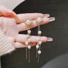 Exquisitos pendientes de perlas con flores huecas de Corea del Sur, nuevos pendientes largos y elegantes con borlas y flores incrustadas con diamantes, venta al por mayor