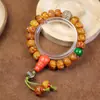 Pulsera Wen play talla en hueso de yak pulsera de semillas de pasión accesorios de Tianzhu del Tíbet imitación Qiu Jiao Huang Caishen joyería al por mayor