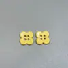 Stock Nuevo Botones de Trébol de Cuatro Hojas de Colores Camisa Chaqueta para Niños Botones Decorativos Versátiles Botones de Plástico Pintura en Spray Botones de Cuatro Agujeros