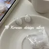 Pendientes de celebridad de internet de Dongdaemun, Corea, plata de ley S925, pendientes de botón ovalados texturizados finamente elaborados, diseño simple y elegante