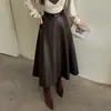 Falda midi de piel para mujer para otoño e invierno, de cintura alta, falda larga con bolsillos, que cubre la cadera y efecto adelgazante
