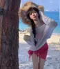 Moda Nueva de Verano Estilo Fresco Conjunto de Tres Piezas Estilo Puro Deseo Suéter Cubre-Traje Estilo Coreano Sesión de Fotos de Vacaciones en la Playa Bikini