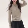 Suéter de punto con capucha color naranja estilo coreano para mujer, diseñado para usar en capas en otoño e invierno, con corte ajustado y efecto adelgazante